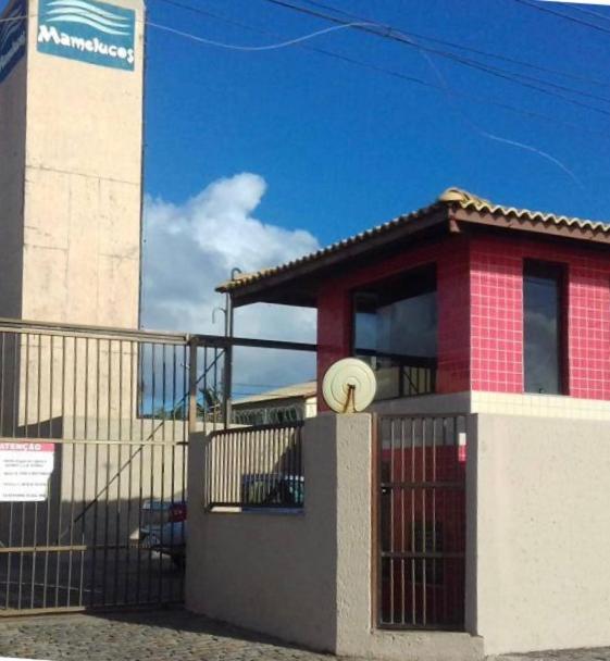 Chalé em frente à Praia Salvador Exterior foto